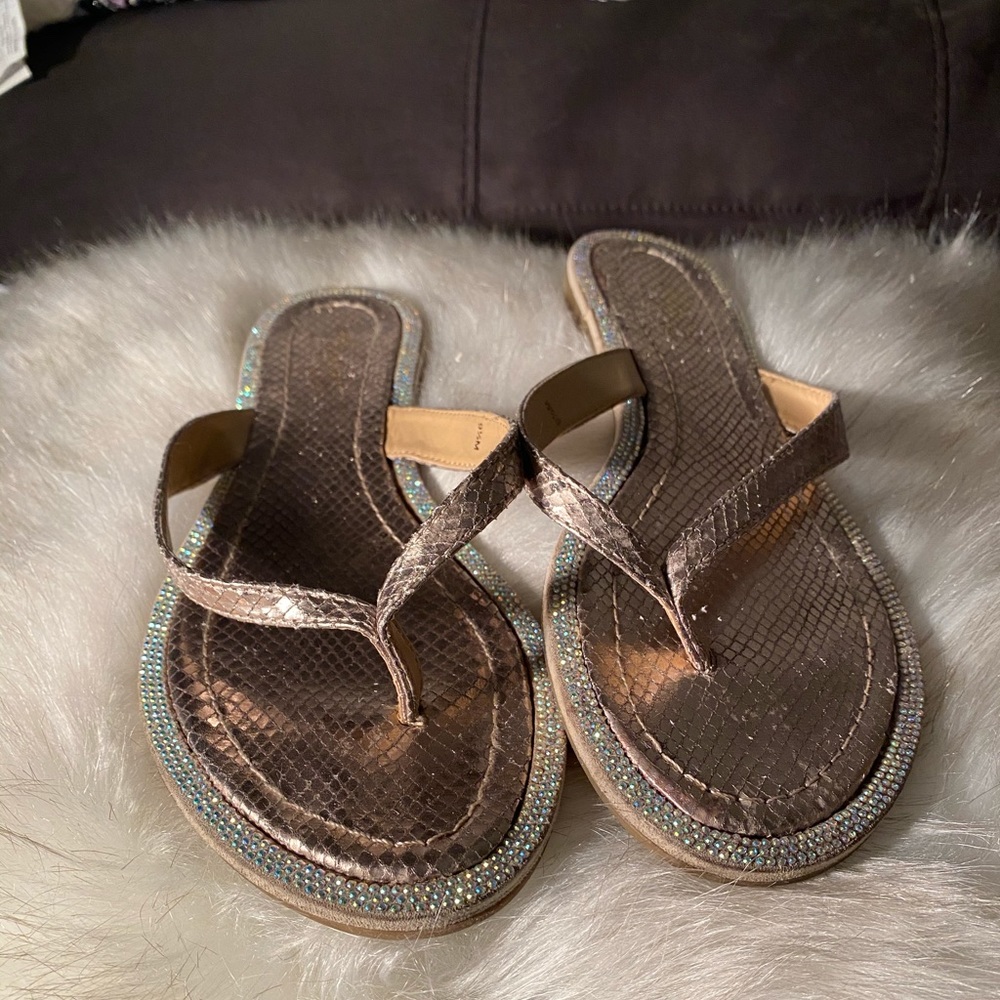Gold sandals with rhinestone accents